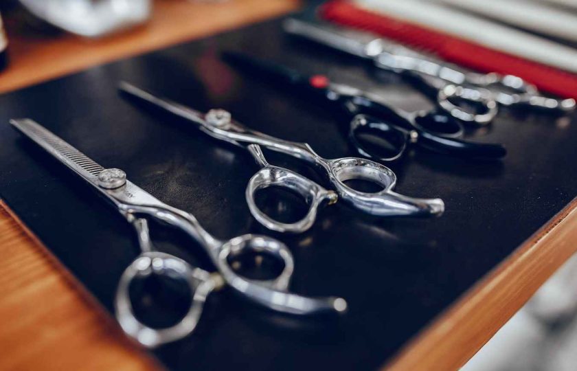 stylish-man-sitting-in-a-barbershop-2023-11-27-05-01-37-utc_11zon (1) (1)_11zon